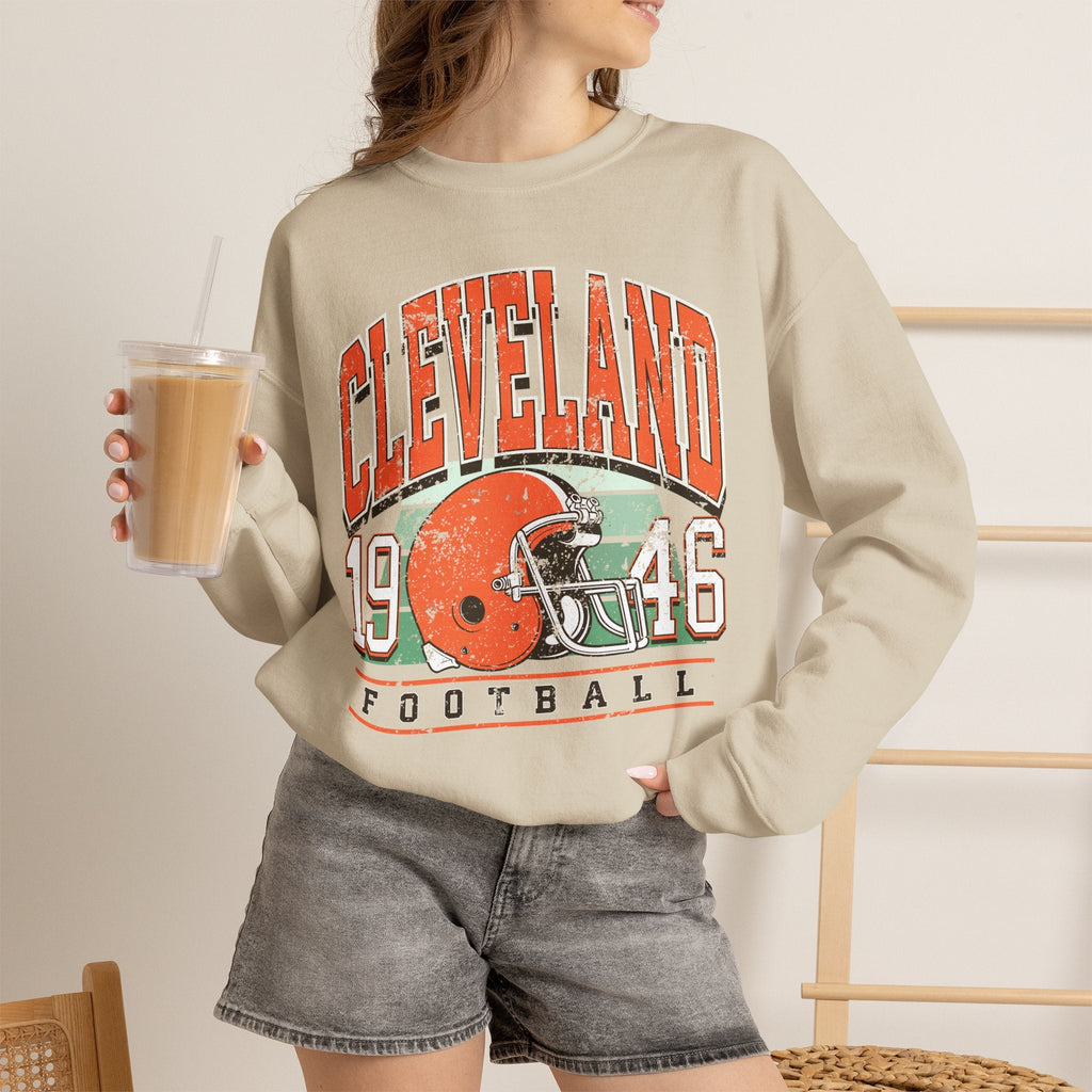 Cleveland retro 1946 football crewneck lifestyle mockup in sand