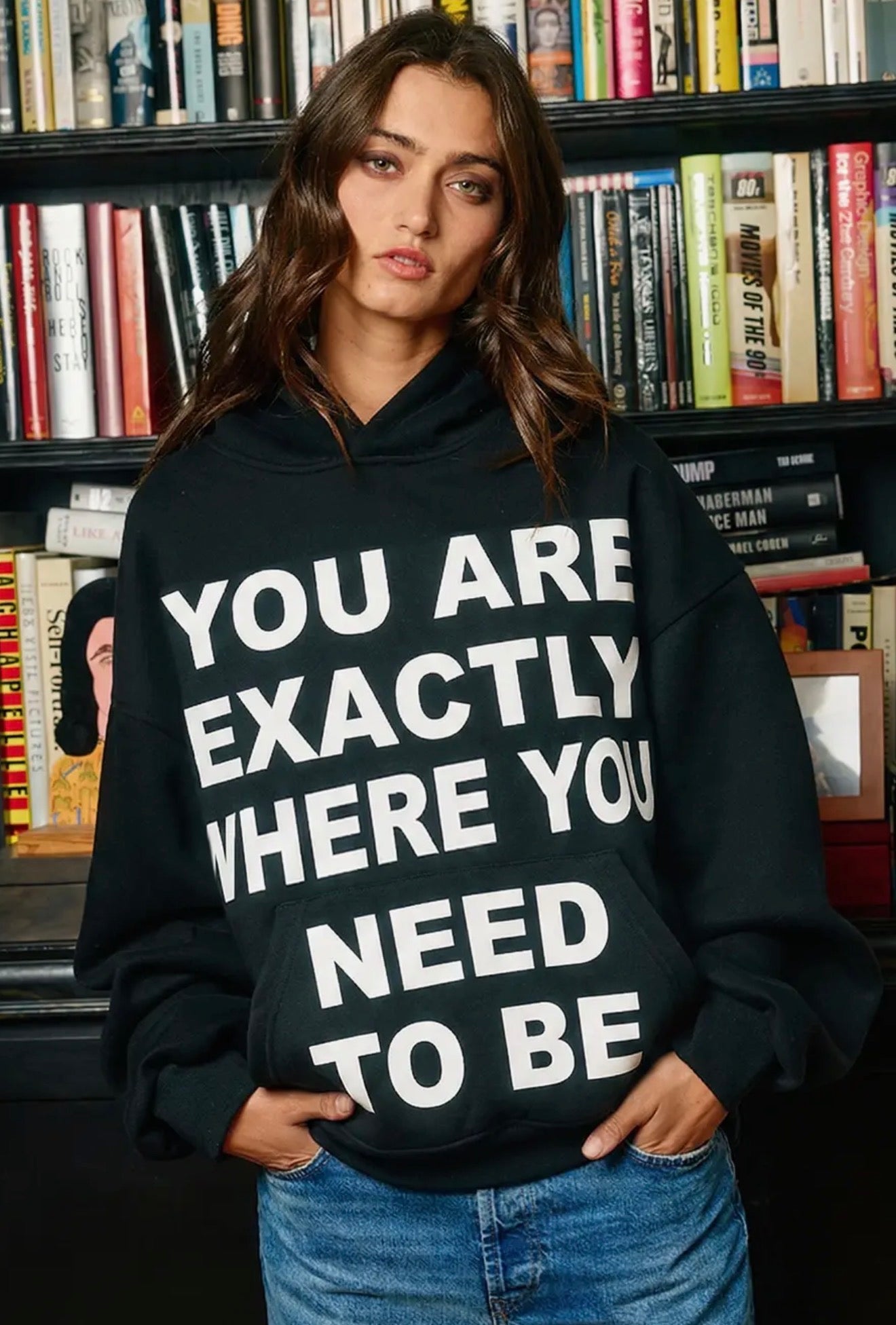 Close front view of black statement graphic hoodie