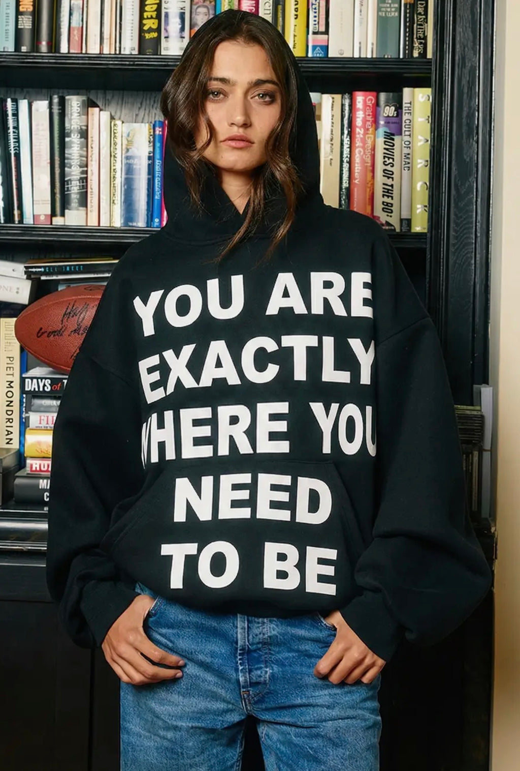 Black oversized hoodie with You Are Exactly Where You Need to Be graphic shown from the front