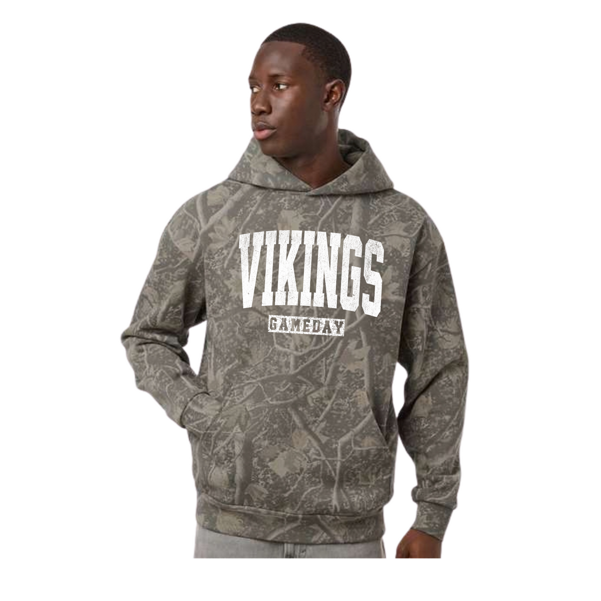 Model wearing Hoover Vikings Gameday Deadwood Tree Camo heavyweight hoodie