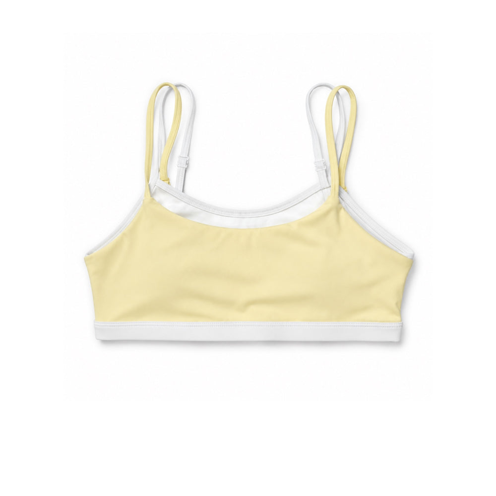 Pale lemon yellow double-strap active top with white contrast trim