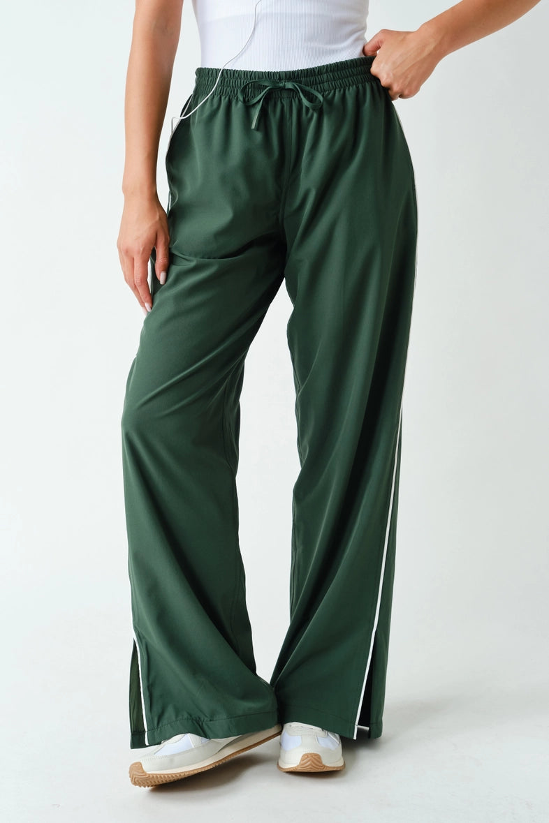 Green piped wide-leg track pants front view