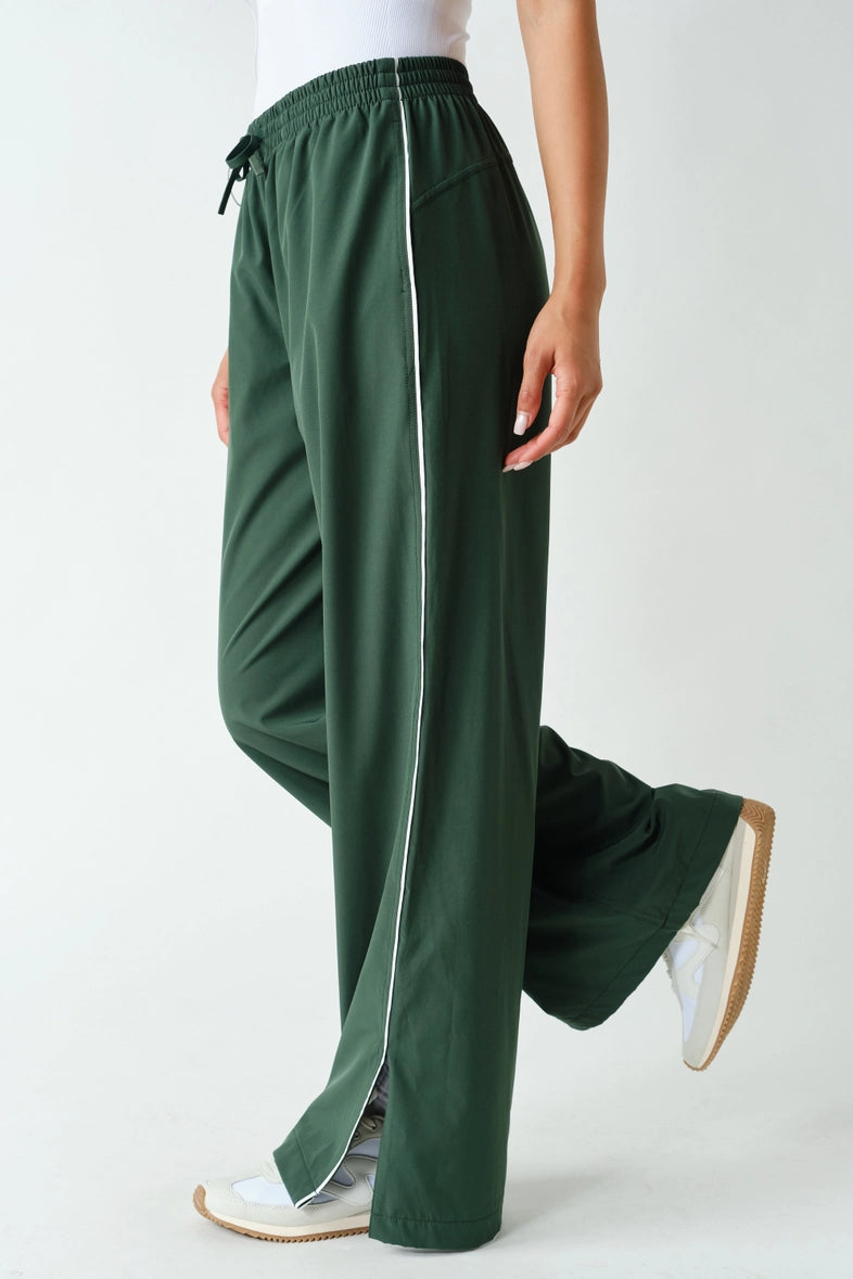 Green piped wide-leg track pants side view